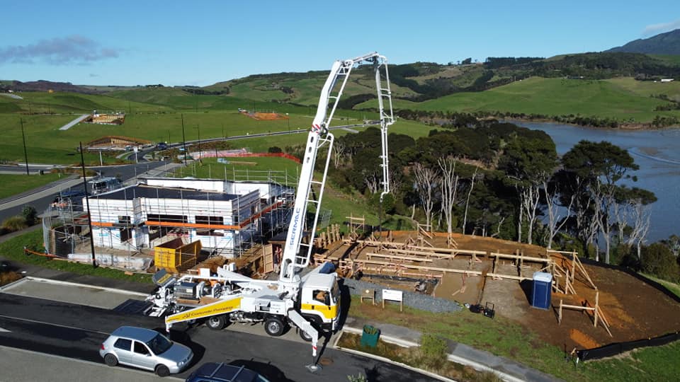 Boom pump on building site in Raglan, NZ