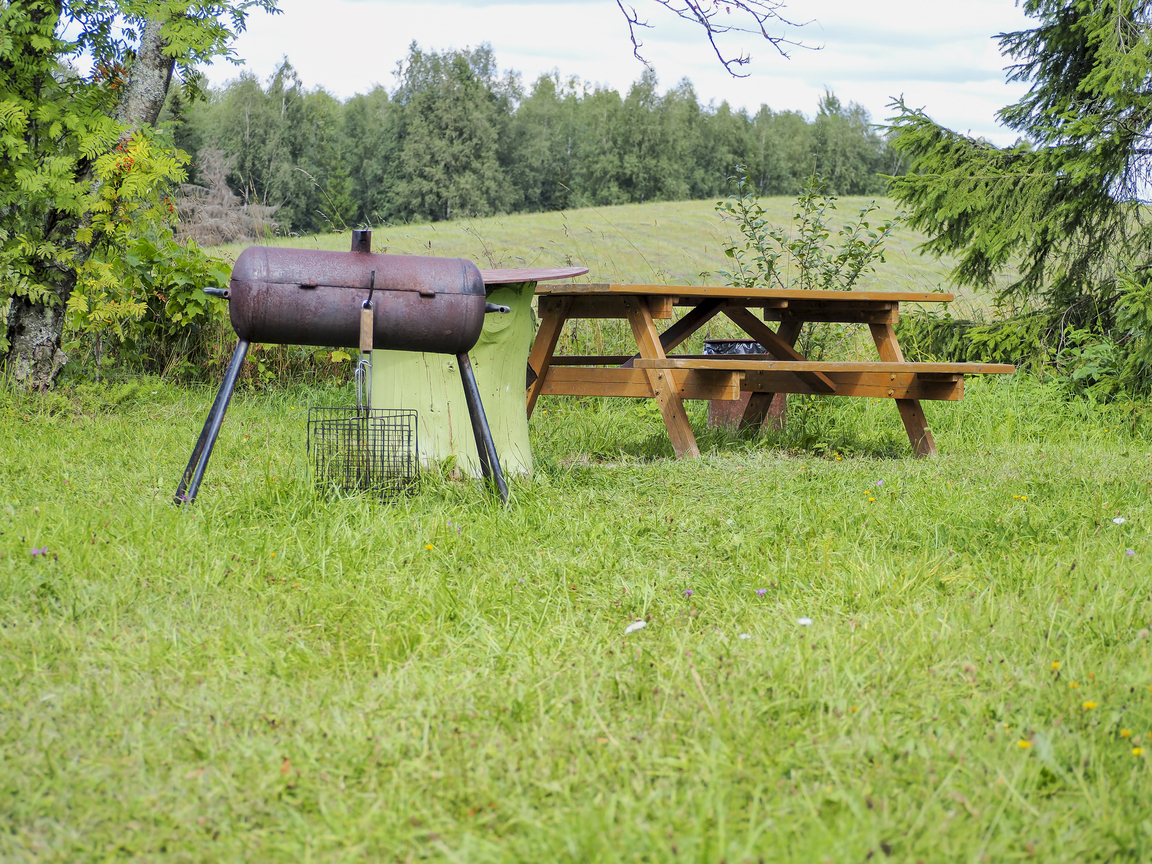 Outdoor grill with Smoker in field